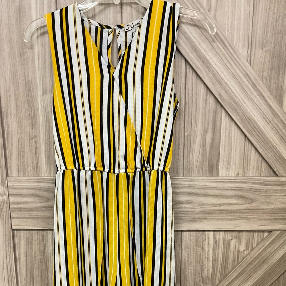 J for Jusyify jumpsuit……slit legs…